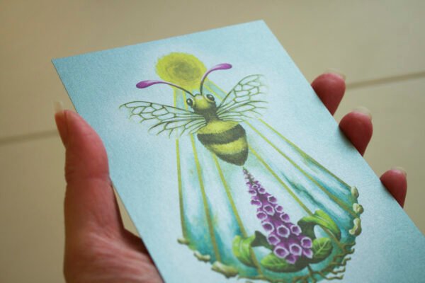 Close Up of Silver Pearlescent Fantasy Honey Bee Art Postcard showing glitter shine and magenta colour details