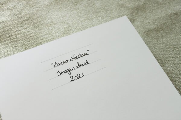 Handwritten black text on back of A4 sized art print which reads: “Sacro Nectare”, Imogen Smid, 2020