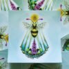 Round Honey Bee Sticker of Druidic Sigil lying on other bee stickers with pretty blue, magenta, yellow and green colours