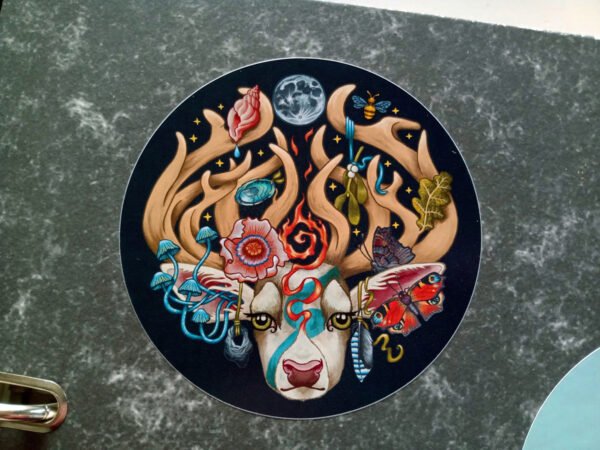 Colourful Circular Sticker of the fantasy digital painting “The Stag’s Head” by Imogen Smid stuck on grey work folder