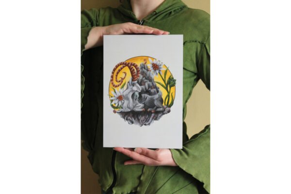 Artist holding A4 Digital Print of Painting “Mountain Goat Elder”. Gift for goat lover or Capricorn zodiac astrological sign