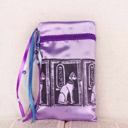 Standing purple poly-satin pouch with hand printed Bastet pattern, printed using a hand carved lino stamp by Imogen Smid