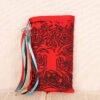 Standing red taffeta pouch with hand printed Celtic tree pattern, printed using a hand carved lino stamp by Imogen Smid