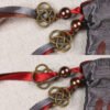 Close Up of Cernunnos Stag God Pouch showing red, grey and brown ribbons, pearl brown plastic beads and metal knotwork charms