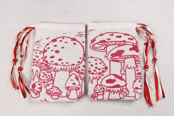 Red coloured printing on both sides of toadstool bag, inspired by beautiful fly agaric toadstools from the world of mycology