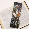 Oak tree, Quercus robur, bookmark with green, burnt sienna, black and eggshell colours on a black and white page of open book