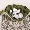 Cream Taffeta Druid Forest Deity pouch with moss green poly-satin lining, white rune stones that spell Imogen are in pouch