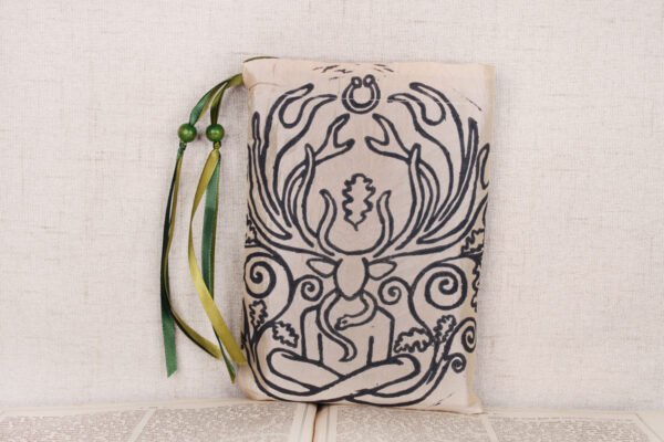 Standing cream taffeta pouch with hand printed Celtic God pattern, printed using a hand carved lino stamp by Imogen Smid