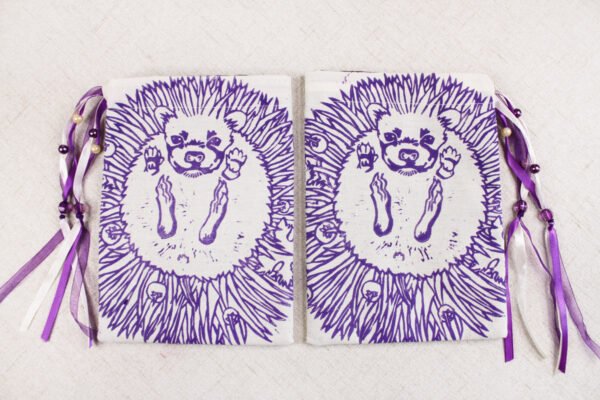 Purple coloured printing on both sides of Hedgehog bag, inspired by the book Natural History by Pliny the Elder