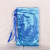 Standing blue pouch with hand printed Mythology bird beast pattern, printed using hand carved lino stamps by Imogen Smid