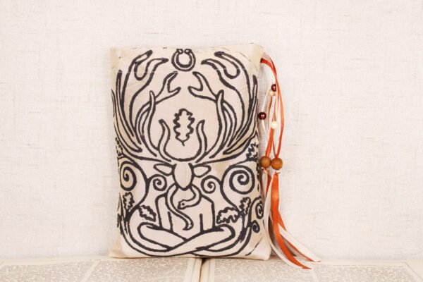 Standing cream taffeta pouch with hand printed Cernunnos oak pattern, printed using hand carved lino stamps by Imogen Smid