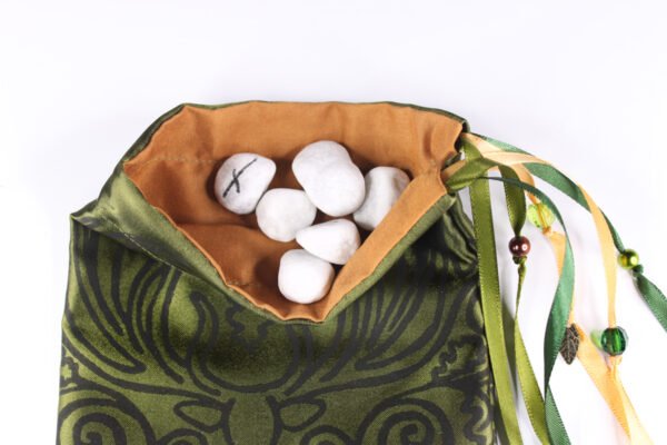 Moss green Poly-Satin Cernunnos pouch with ochre cotton lining, white rune stones that spell Imogen are sitting in the pouch