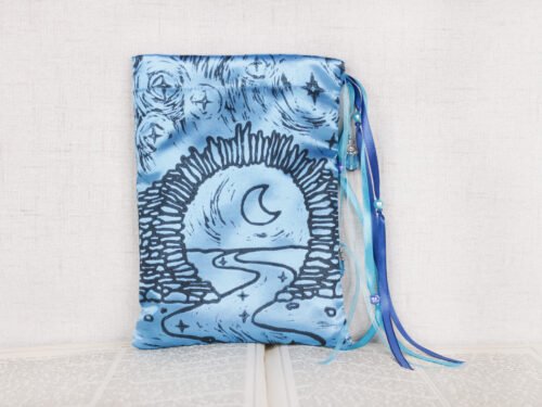 Standing turquoise poly-satin pouch with hand printed Moon Gate pattern, printed using hand carved lino stamp by Imogen Smid