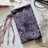 Hand printed pouch with, lino cutters, forged scissors and hand carved lino stamp which was used for printing this pouch