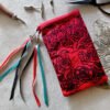 Hand printed pouch with, lino cutters, forged scissors and hand carved lino stamp which was used for printing this pouch