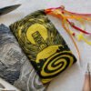 Hand printed pouch with, lino cutters, forged scissors and hand carved lino stamp which was used for printing this pouch