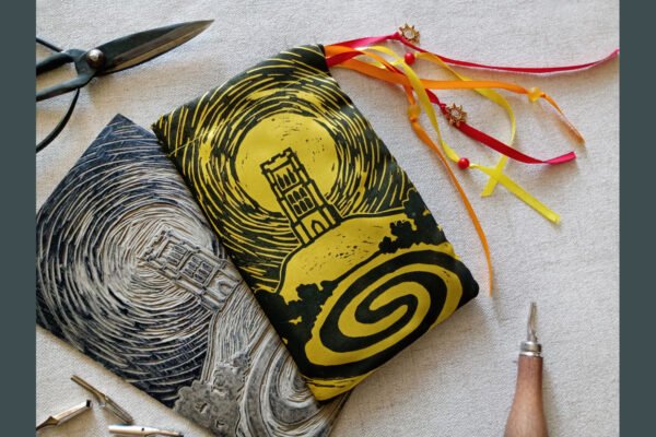 Hand printed pouch with, lino cutters, forged scissors and hand carved lino stamp which was used for printing this pouch