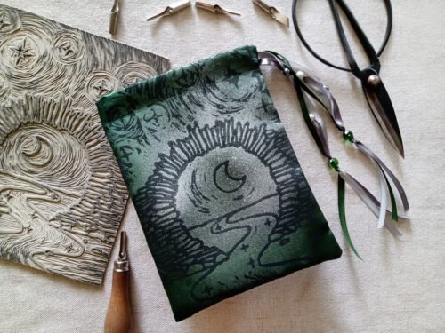 Hand printed pouch with, lino cutters, forged scissors and hand carved lino stamp which was used for printing this pouch