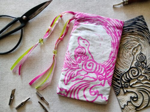 Hand printed pouch with, lino cutters, forged scissors and hand carved lino stamp which was used for printing this pouch